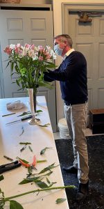 Kevin Decker preparing altar flowers for Easter