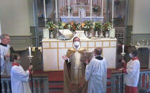 Fr. Matt Stromberg reading the Gospel on Easter Sunday